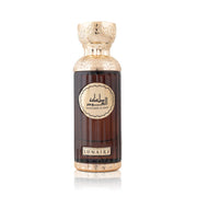 Luxuriöser, prunkvoll verzierter 100-ml-Flakon des Mamlakat Al Oud Seerati Lunaire Eau de Parfum für Damen und Herren vor neutralem Hintergrund.