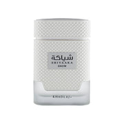 Majestätischer, mattweißer Designer-Flakon von Khadlaj Shiyaaka Snow Eau de Parfum 100ml mit silbernen Akzenten exklusiv erhältlich bei Dinar Parfums Wien.