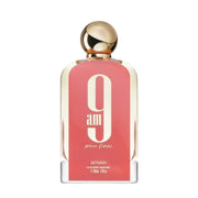 Eleganter, femininer Flakon von Afnan 9AM Pour Femme Eau de Parfum 100ml – exklusiv im dinar.at Onlineshop erhältlich.
