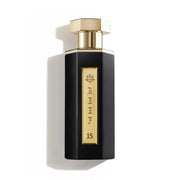 Schwerer matt-schwarzer Luxusflakon des Reef Perfumes Reef 15 Eau de Parfum 100ml mit goldener Metall-Plakette vor elegantem Hintergrund – exklusiv bei dinar.at